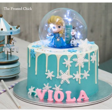 Frozen Elsa & Olaf Inspired Globe Drip Cake